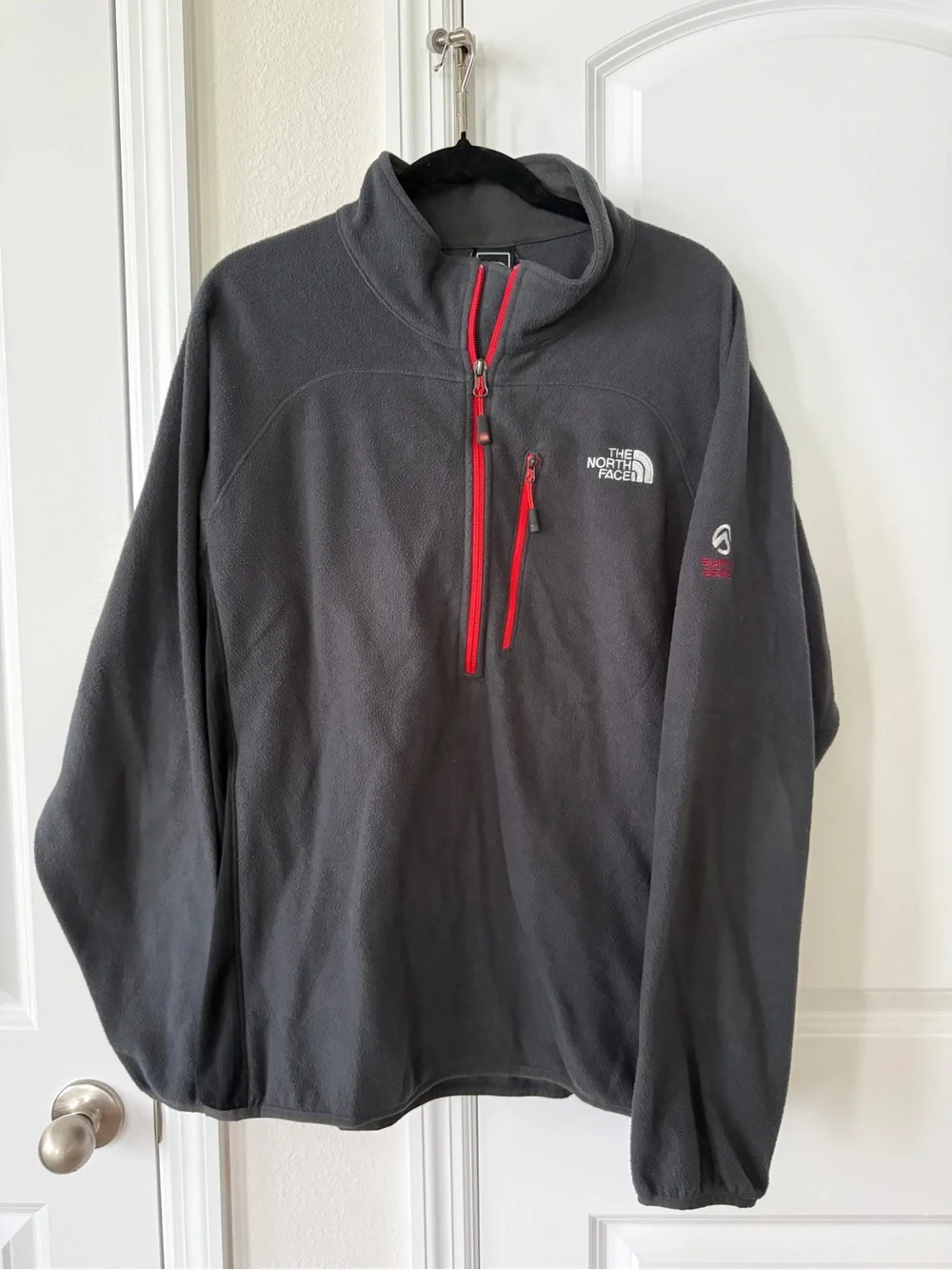 The North Face Men's Black Fleece Pullover with Red Zip Accents